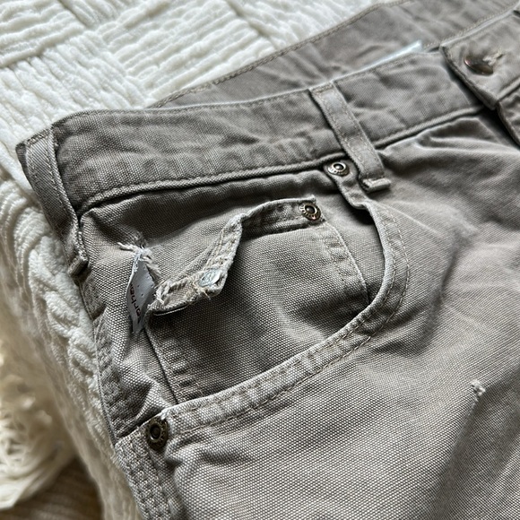 Carhartt distressed carpenter pants with some stains and holes. #10015 - Picture 9 of 11